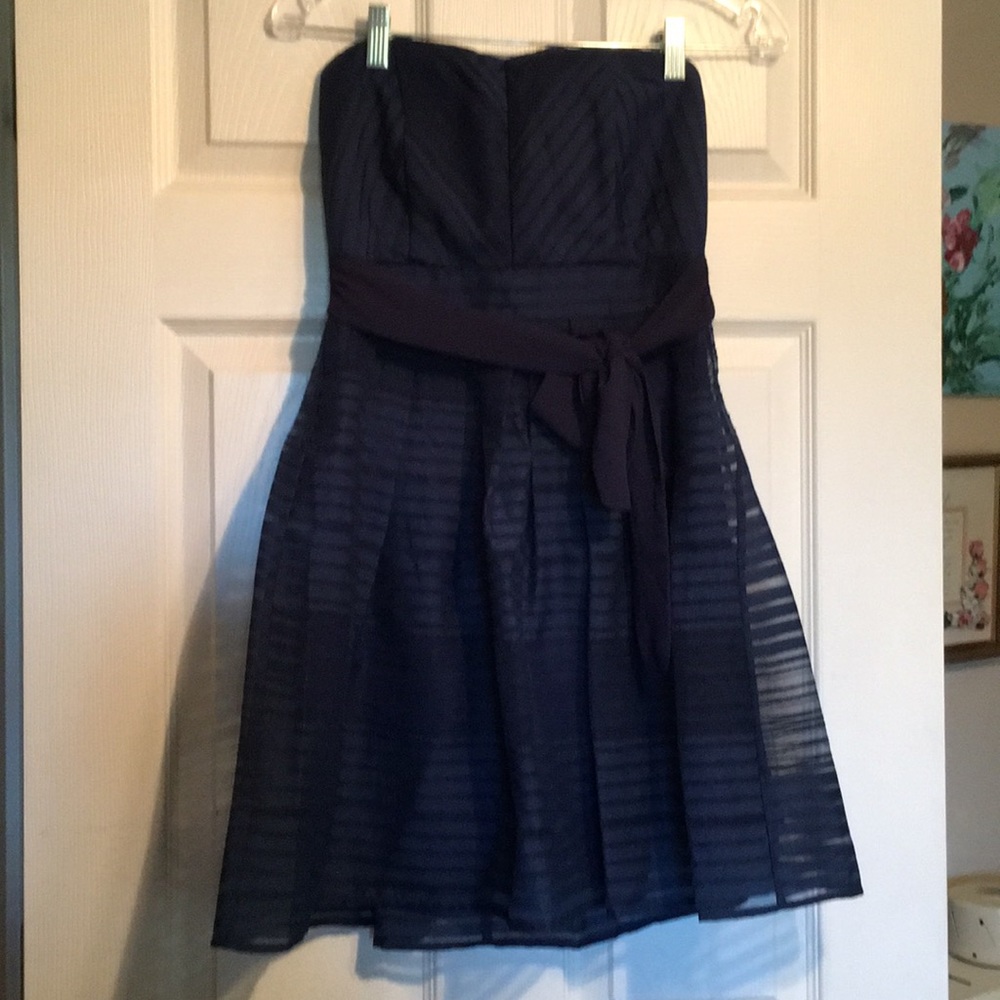 Flattering, chic navy cocktail dress
